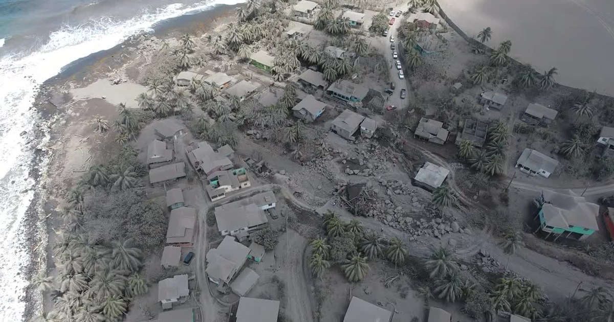 Island with houses covered in ashes